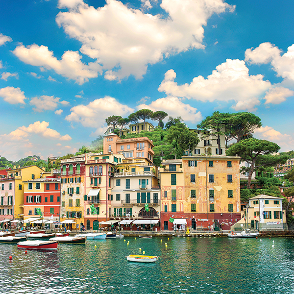 This image has an empty alt attribute; its file name is Italy-Colorful-Buildings-by-River.jpg